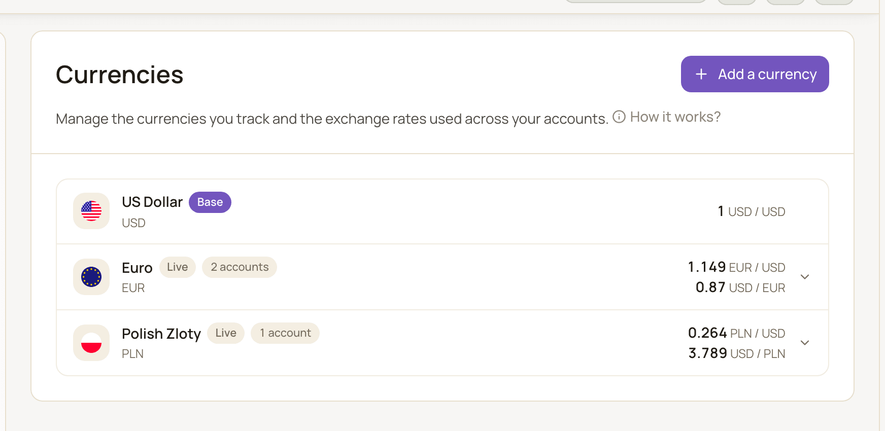 The Currencies settings page with the base currency (USD) pinned first and two other currencies (EUR, PLN) showing their Live rates and account counts.